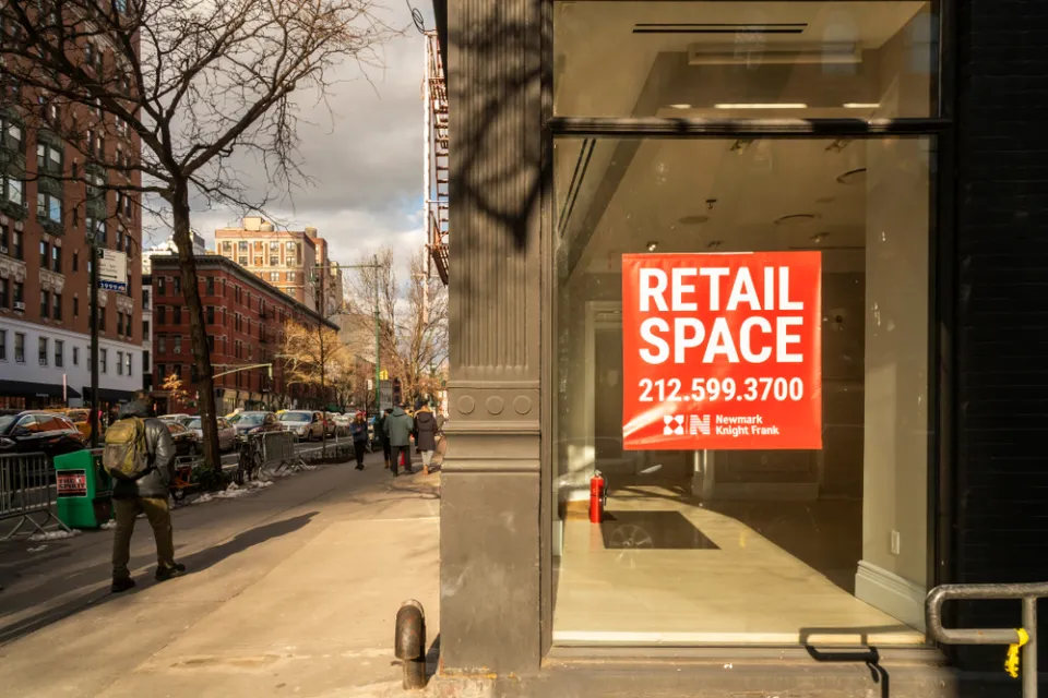 Vacant storefront on a New York City street with For Lease sign